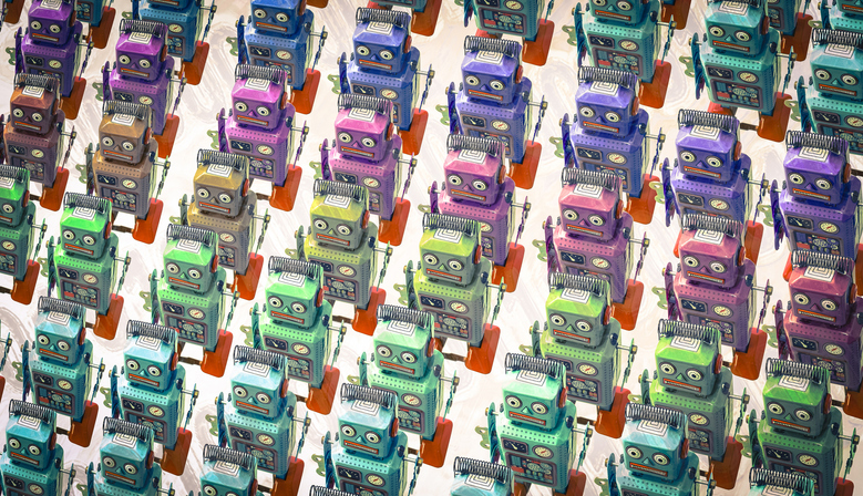 Multi-colored robots that all look the same marching in lines.